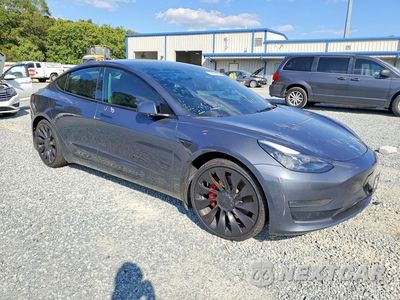 Czwarte zdjęcie samochodu z boku: 2023 TESLA MODEL 3 VIN:5YJ3E1EC0PF587965 - miniatura