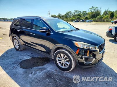 Czwarte zdjęcie samochodu z boku: 2016 KIA SORENTO LX VIN:5XYPG4A35GG025622 - miniatura