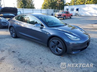 Czwarte zdjęcie samochodu z boku: 2018 TESLA MODEL 3 VIN:5YJ3E1EB0JF129180 - miniatura