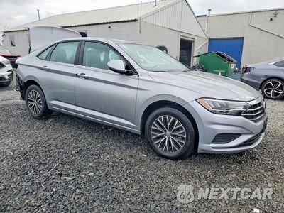 Czwarte zdjęcie samochodu z boku: 2021 VOLKSWAGEN JETTA S VIN:3VWC57BU3MM043576 - miniatura