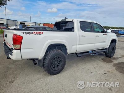 Trzecie zdjęcie samochodu z tyłu: 2017 TOYOTA TACOMA TRD SPORT VIN:5TFDZ5BN5HX023970 - miniatura