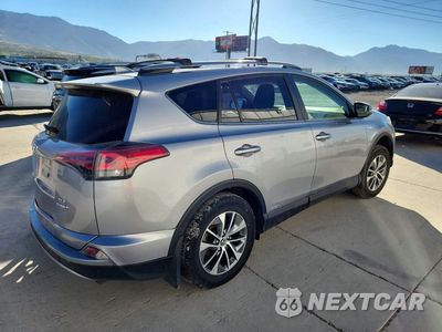 Trzecie zdjęcie samochodu z tyłu: 2018 TOYOTA RAV4 HYBRID XLE VIN:JTMRJREV8JD175748 - miniatura