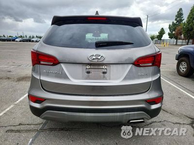 Zdjęcie 6 z 14 samochodu: 2018 HYUNDAI SANTA FE SPORT 2.4L VIN:5NMZU3LB9JH101954 - miniatura