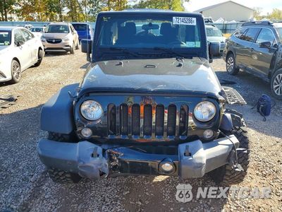 Piąte zdjęcie samochodu w środku: 2016 JEEP WRANGLER UNLIMITED SPORT VIN:1C4BJWDG3GL152170 - miniatura