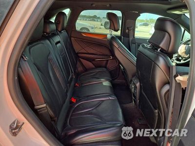 Zdjęcie 11 z 14 samochodu: 2017 LINCOLN MKC RESERVE VIN:5LMCJ3C90HUL69153 - miniatura