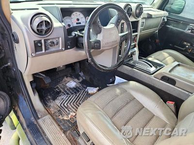 Zdjęcie 8 z 13 samochodu: 2003 HUMMER H2 VIN:5GRGN23UX3H101352 - miniatura