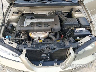 Zdjęcie 11 z 12 samochodu: 2005 HYUNDAI ELANTRA VIN:KMHDN46DX5U053319 - miniatura