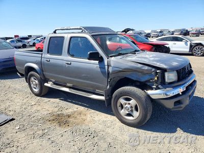 Czwarte zdjęcie samochodu z boku: 2000 NISSAN FRONTIER XE VIN:1N6ED27T5YC414355 - miniatura