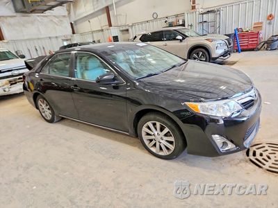 Czwarte zdjęcie samochodu z boku: 2012 TOYOTA CAMRY XLE V6 VIN:4T1BK1FK8CU507660 - miniatura
