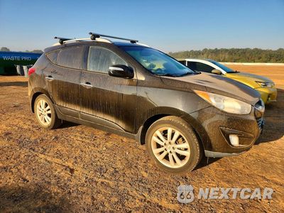 Czwarte zdjęcie samochodu z boku: 2013 HYUNDAI TUCSON LIMITED VIN:KM8JU3AC0DU657426 - miniatura