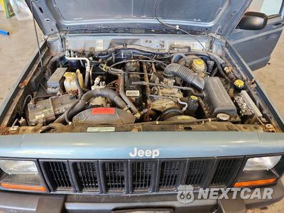 Zdjęcie 12 z 13 samochodu: 1998 JEEP CHEROKEE SE VIN:1J4FJ28S4WL147111 - miniatura