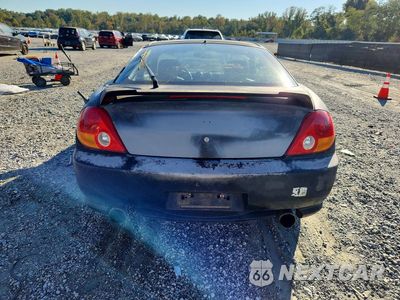 Zdjęcie 6 z 12 samochodu: 2004 HYUNDAI TIBURON GT VIN:KMHHN65FX4U118474 - miniatura