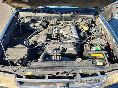 Zdjęcie 11 z 12 samochodu: 1999 TOYOTA TACOMA V6 VIN:4TAVN52N5XZ483483 - miniatura