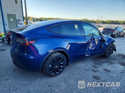 Trzecie zdjęcie samochodu z tyłu: 2022 TESLA MODEL Y VIN:7SAYGDEE7NF365510 - miniatura