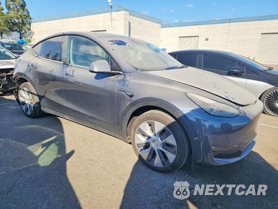 Czwarte zdjęcie samochodu z boku: 2023 TESLA MODEL Y VIN:7SAYGDEE1PF907705 - miniatura