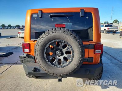 Zdjęcie 6 z 13 samochodu: 2011 JEEP WRANGLER UNLIMITED SAHARA VIN:1J4BA5H13BL604184 - miniatura