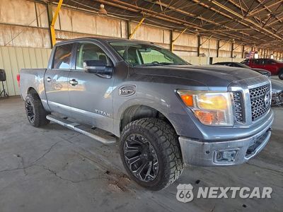 Czwarte zdjęcie samochodu z boku: 2017 NISSAN TITAN SV VIN:1N6AA1E53HN565446 - miniatura