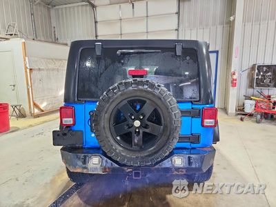 Zdjęcie 6 z 14 samochodu: 2015 JEEP WRANGLER UNLIMITED SPORT VIN:1C4HJWDG8FL707798 - miniatura