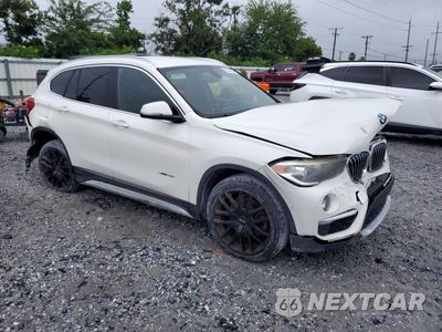 Czwarte zdjęcie samochodu z boku: 2017 BMW X1 SDRIVE28I VIN:WBXHU7C39H5H33643 - miniatura