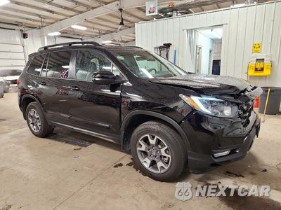 Czwarte zdjęcie samochodu z boku: 2023 HONDA PASSPORT TRAIL SPORT VIN:5FNYF8H60PB023556 - miniatura