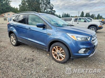Czwarte zdjęcie samochodu z boku: 2018 FORD ESCAPE SE VIN:1FMCU9GD8JUB61944 - miniatura