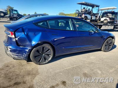 Trzecie zdjęcie samochodu z tyłu: 2024 TESLA MODEL 3 VIN:5YJ3E1EA8RF733885 - miniatura
