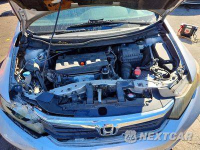 Zdjęcie 11 z 12 samochodu: 2012 HONDA CIVIC LX VIN:19XFB2F54CE034165 - miniatura