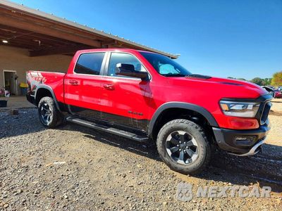 Czwarte zdjęcie samochodu z boku: 2019 RAM 1500 REBEL VIN:1C6SRFLT9KN580577 - miniatura