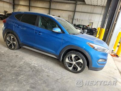 Czwarte zdjęcie samochodu z boku: 2018 HYUNDAI TUCSON SPORT VIN:KM8J33ALXJU695034 - miniatura