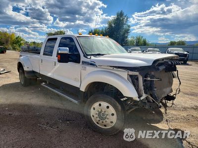 Czwarte zdjęcie samochodu z boku: 2015 FORD F450 SUPER DUTY VIN:1FT8W4DT0FEC45597 - miniatura