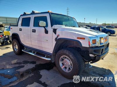 Czwarte zdjęcie samochodu z boku: 2005 HUMMER H2 SUT VIN:5GRGN22U25H111748 - miniatura