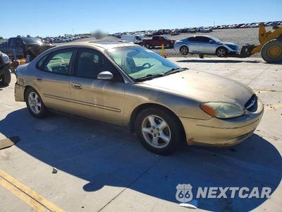 Czwarte zdjęcie samochodu z boku: 2001 FORD TAURUS SES VIN:1FAFP55UX1G216922 - miniatura