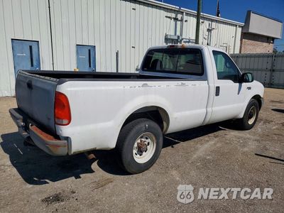 Trzecie zdjęcie samochodu z tyłu: 1999 FORD F250 SUPER DUTY VIN:1FTNF20L7XEC11316 - miniatura
