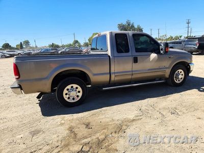 Trzecie zdjęcie samochodu z tyłu: 2002 FORD F250 SUPER DUTY VIN:1FTNX20F62ED04795 - miniatura