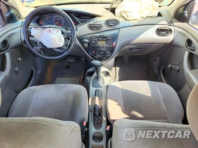 Zdjęcie 8 z 12 samochodu: 2001 FORD FOCUS LX VIN:1FAFP33P81W296096 - miniatura