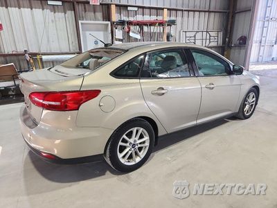 Trzecie zdjęcie samochodu z tyłu: 2015 FORD FOCUS SE VIN:1FADP3F29FL231242 - miniatura
