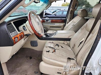 Zdjęcie 7 z 13 samochodu: 2003 LINCOLN NAVIGATOR VIN:5LMFU27R33LJ01012 - miniatura