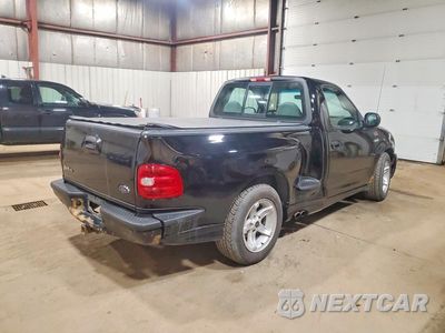 Trzecie zdjęcie samochodu z tyłu: 1999 FORD F150 SVT LIGHTNING VIN:2FTZF0733XCB06757 - miniatura