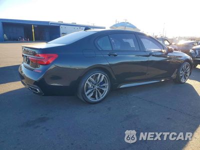 Trzecie zdjęcie samochodu z tyłu: 2019 BMW M760 XI VIN:WBA7H6C59KG615235 - miniatura