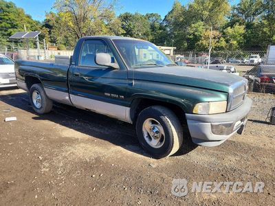Czwarte zdjęcie samochodu z boku: 1999 DODGE RAM 1500 VIN:1B7HC16Z9XS266489 - miniatura