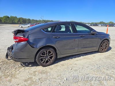 Trzecie zdjęcie samochodu z tyłu: 2018 FORD FUSION SE VIN:3FA6P0H75JR183538 - miniatura