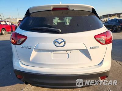 Zdjęcie 6 z 13 samochodu: 2016 MAZDA CX-5 TOURING VIN:JM3KE2CY6G0871476 - miniatura