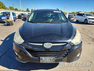 Piąte zdjęcie samochodu w środku: 2013 HYUNDAI TUCSON GLS VIN:KM8JU3AC9DU554148 - miniatura