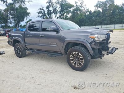Czwarte zdjęcie samochodu z boku: 2021 TOYOTA TACOMA TRD SPORT VIN:5TFCZ5AN9MX273607 - miniatura