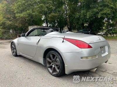 Trzecie zdjęcie samochodu z tyłu: 2005 NISSAN 350Z ENTHUSIAST VIN:JN1AZ36AX5M757809 - miniatura