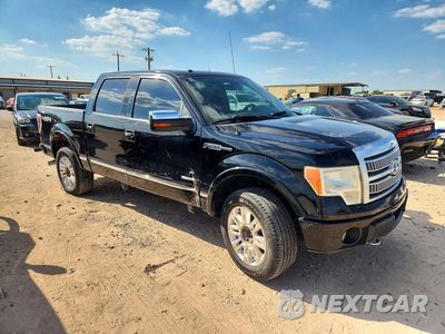 Czwarte zdjęcie samochodu z boku: 2011 FORD F150 SUPERCREW VIN:1FTFW1ET5BFD09450 - miniatura