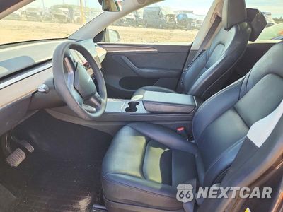 Zdjęcie 7 z 12 samochodu: 2024 TESLA MODEL Y VIN:7SAYGDEE1RF182271 - miniatura