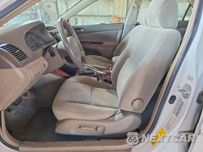 Zdjęcie 7 z 12 samochodu: 2003 TOYOTA CAMRY XLE VIN:4T1BE30K83U247899 - miniatura
