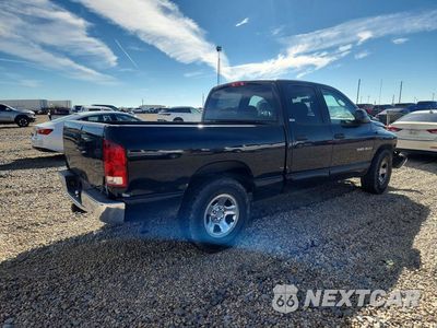 Trzecie zdjęcie samochodu z tyłu: 2002 DODGE RAM 1500 VIN:3D7HA18N62G129953 - miniatura