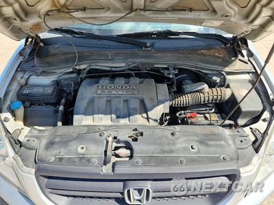 Zdjęcie 12 z 13 samochodu: 2005 HONDA PILOT EXL VIN:2HKYF18775H556258 - miniatura
